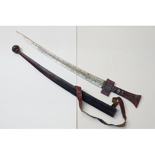 272 - A Nigerian Takouba / Tuarag sword complete with scabbard and knife.