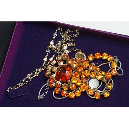 275 - A collection of vintage and contemporary costume jewellery to include necklaces, earrings, bracelets... 