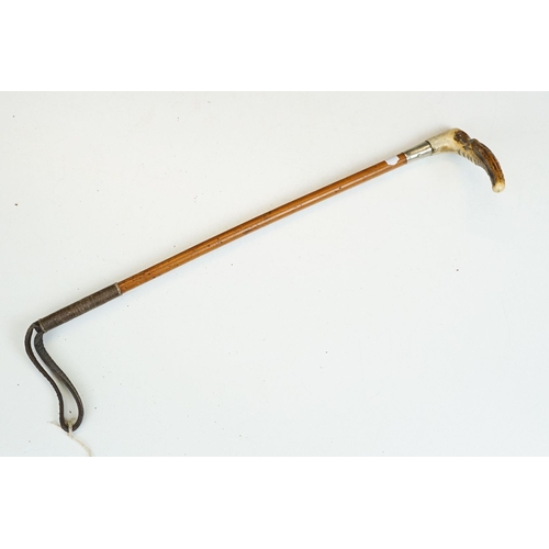 278 - A collection of eleven vintage riding crops to include leather, bamboo and wooden examples with vari... 