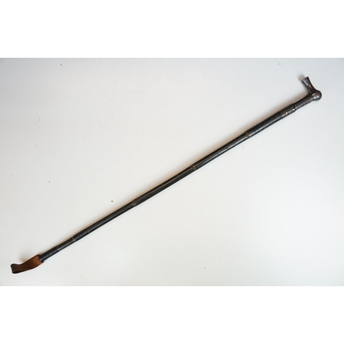 278 - A collection of eleven vintage riding crops to include leather, bamboo and wooden examples with vari... 