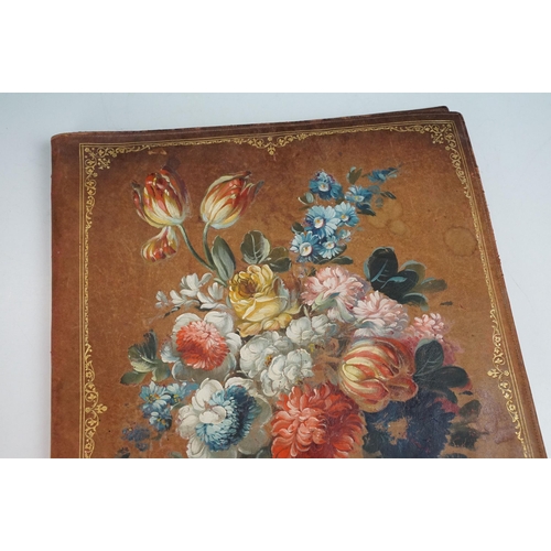 283 - An early 20th century hand painted leather folder / folio with floral decoration, measures approx 44... 