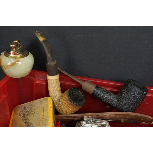 290 - A collection of mixed smoking related collectables to include tobacco pipes, tobacco tins, table lig... 