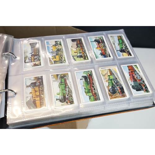 293 - A collection of cigarette card sets within six albums together with loose sets of cigarette and trad... 