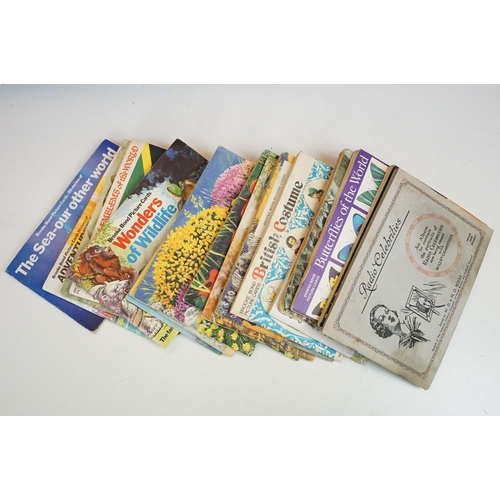 293 - A collection of cigarette card sets within six albums together with loose sets of cigarette and trad... 