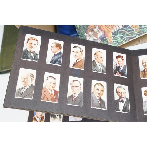 293 - A collection of cigarette card sets within six albums together with loose sets of cigarette and trad... 