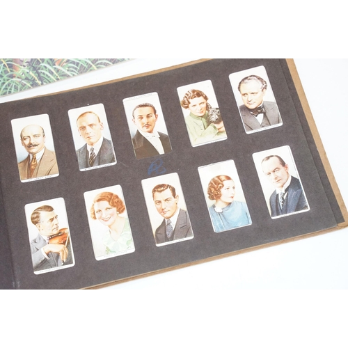 293 - A collection of cigarette card sets within six albums together with loose sets of cigarette and trad... 