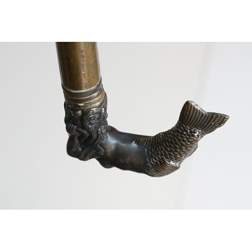 295 - A vintage walking stick with cast brass Mermaid handle and brass fittings.