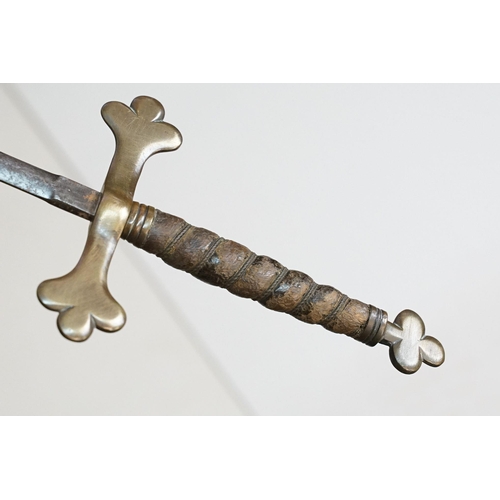 296 - An early to mid 20th century court sword, brass finial and cross guard with leather grip and scabbar... 