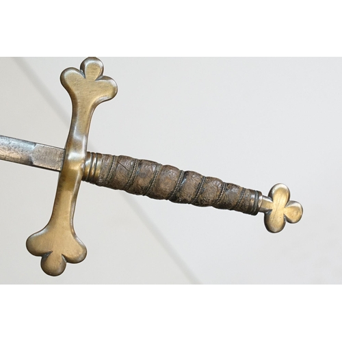 296 - An early to mid 20th century court sword, brass finial and cross guard with leather grip and scabbar... 