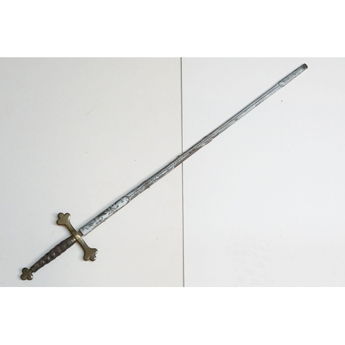 296 - An early to mid 20th century court sword, brass finial and cross guard with leather grip and scabbar... 