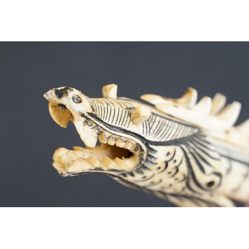 311 - Chinese carved bone dragon form dart gun