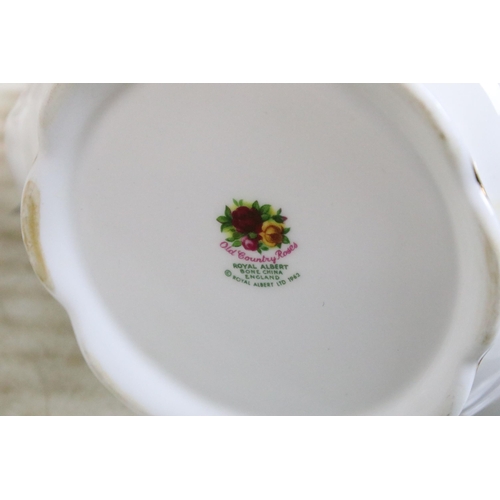 101 - Large collection of Royal Albert 'Old Country Roses' table ware to include twelve bowls, twelve soup... 