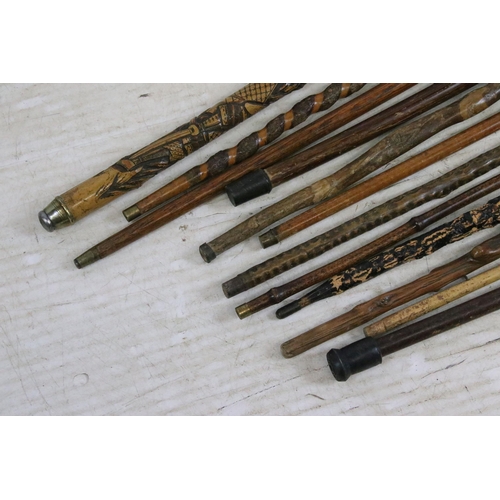 186 - Collection of assorted walking sticks and canes to include bamboo examples with root ball handles (o... 