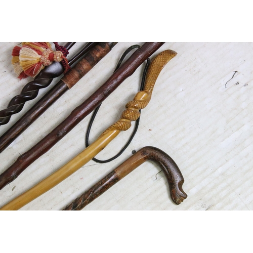 187 - Assorted collection of 20th Century walking sticks to include African carved hardwood examples, a se... 