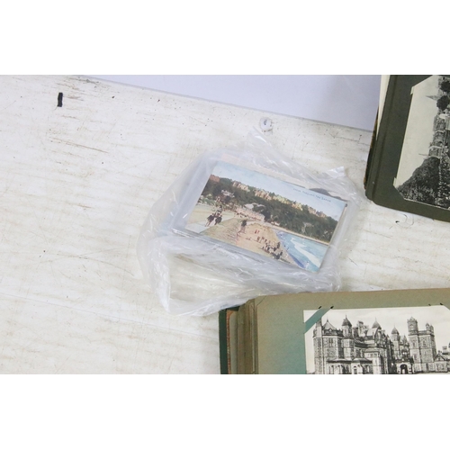 337 - A large collection of mainly early 20th century postcards to include real photo, printed, topographi... 