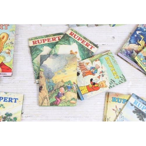 341 - A large collection of vintage Rupert the Bear annuals and books.