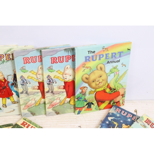 341 - A large collection of vintage Rupert the Bear annuals and books.