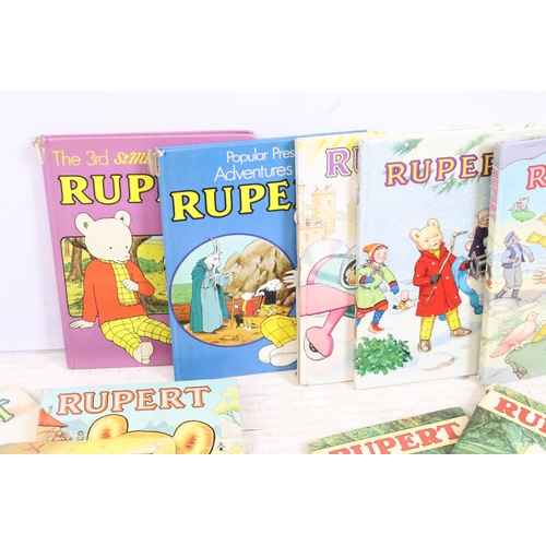 341 - A large collection of vintage Rupert the Bear annuals and books.