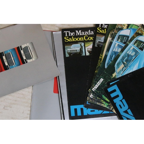 345 - A large collection of over 230 x 1970's and 1980's car brochures to include Ferrari, Mercedes, Ford,... 