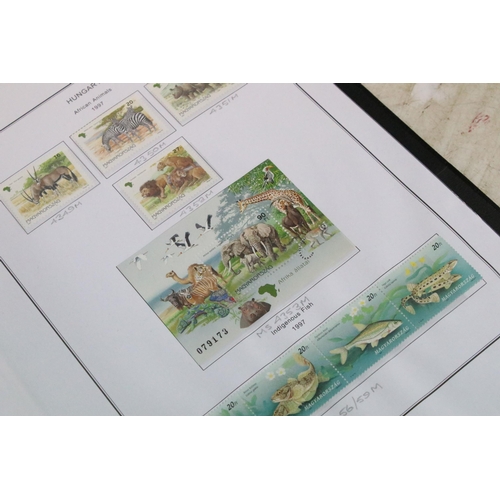 352A - A large collection of well presented and mounted Hungarian stamps, dating from the 1960's through to... 