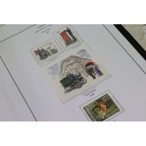 352A - A large collection of well presented and mounted Hungarian stamps, dating from the 1960's through to... 