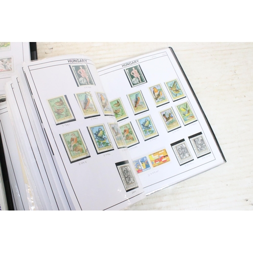 352A - A large collection of well presented and mounted Hungarian stamps, dating from the 1960's through to... 