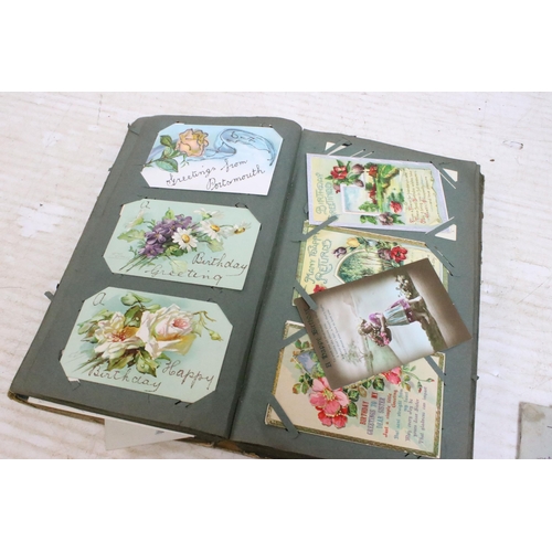 355 - Victorian and early 20th Century post card album of greetings cards, together with three 1930s Cunar... 