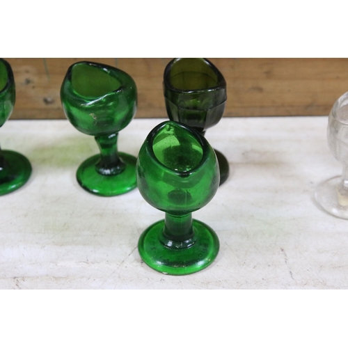 405 - Collection of optical glass eye baths to include green and clear glass examples (1box)