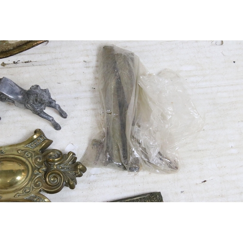 411 - Selection of brass items to include door knobs, scrolled furniture pediments, Salter hanging weighin... 