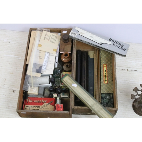 415 - Quantity of vintage writing and measuring equipment to include an assortment of rulers, carousel hol... 