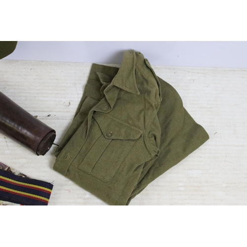 423 - Military items including: map case, WWI leather gaiters, uniform etc