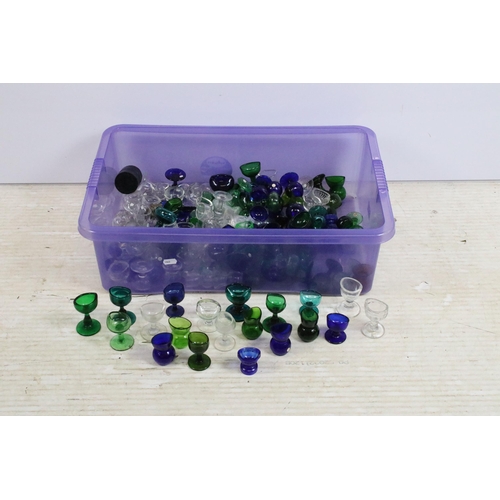 426A - Large selection of antique and vintage coloured mixed shape glass eye baths to include blue, green a... 