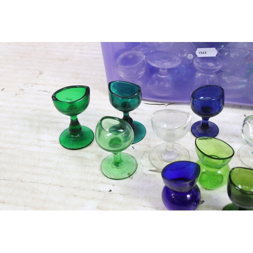 426A - Large selection of antique and vintage coloured mixed shape glass eye baths to include blue, green a... 