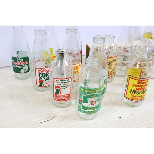 428 - Collection of eighteen mixed vintage advertising milk bottles to include PG Tips, Cadburys, Nescafe,... 