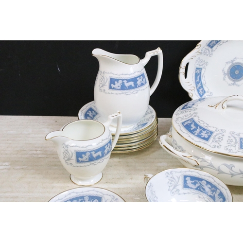 77 - Coalport 'Revelry' blue border part dinner service set to include tea pot, round serving dish, beake... 