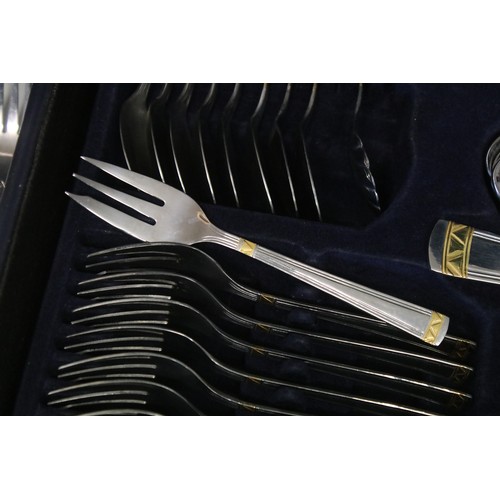 387 - BS Edelstahl Soligen two tone flatware cutlery set housed within briefcase style holder