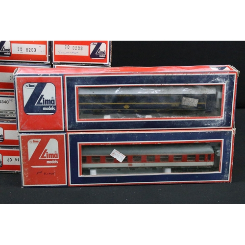 163 - 42 Boxed HO / OO gauge items of rolling stock to include 28 x Lima and 14 x Schicht, featuring coach... 