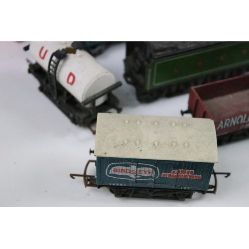 169 - Around 25 OO gauge items of rolling stock to include coaches, wagons, car transporters etc featuring... 