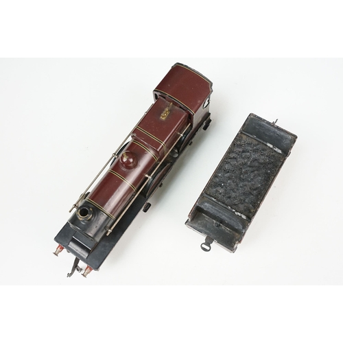 101 - O gauge 4-4-0 '999' locomotive & tender in maroon livery, unmarked