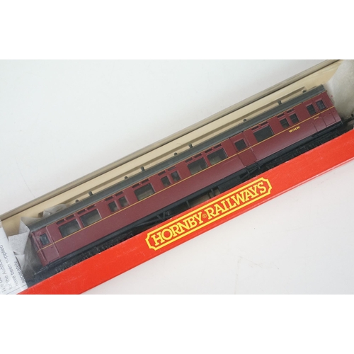 115 - Three boxed Hornby OO gauge items of rolling stock to include R4100B BR Autocoach W196W, R4100D BR A... 