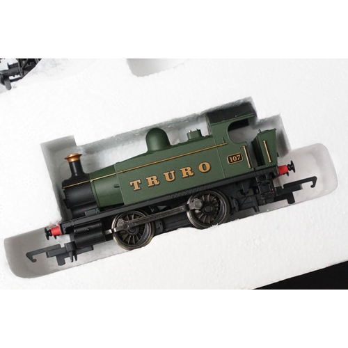 124 - Boxed Hornby OO gauge R1142 Western Passenger train set appearing complete, plus a boxed Hornby R103... 