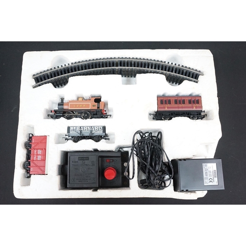 124 - Boxed Hornby OO gauge R1142 Western Passenger train set appearing complete, plus a boxed Hornby R103... 