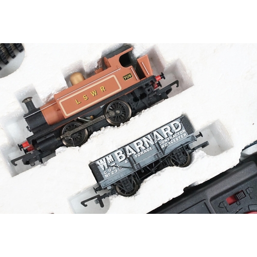 124 - Boxed Hornby OO gauge R1142 Western Passenger train set appearing complete, plus a boxed Hornby R103... 