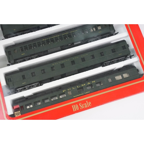 144 - Three boxed Rivarossi HO gauge locomotives / coach sets to include 5452 4-6-4 Hudson Chesapeake & Oh... 