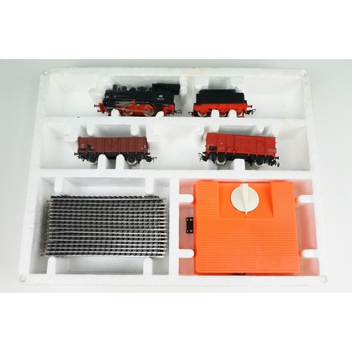 151 - Two boxed Piko HO gauge train sets, both appearing complete with locomotives, coaches, track & contr... 