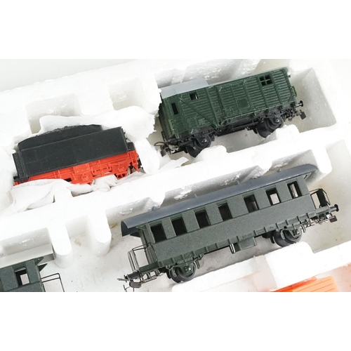 151 - Two boxed Piko HO gauge train sets, both appearing complete with locomotives, coaches, track & contr... 