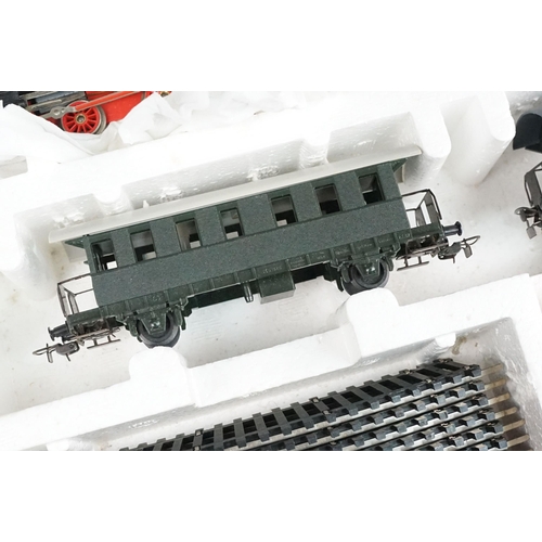 151 - Two boxed Piko HO gauge train sets, both appearing complete with locomotives, coaches, track & contr... 