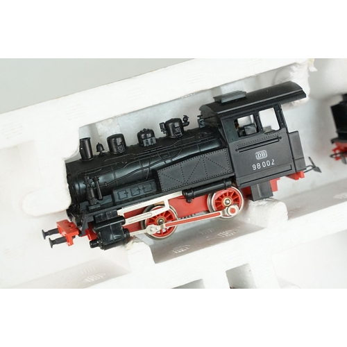 151 - Two boxed Piko HO gauge train sets, both appearing complete with locomotives, coaches, track & contr... 