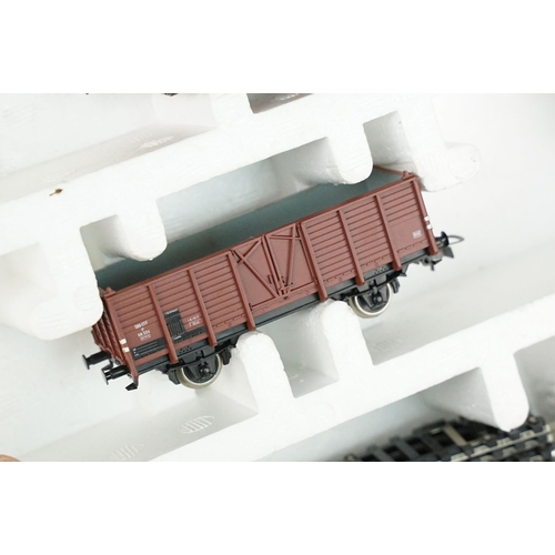 151 - Two boxed Piko HO gauge train sets, both appearing complete with locomotives, coaches, track & contr... 