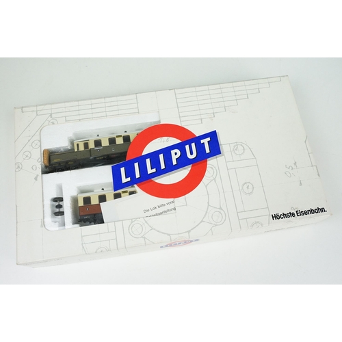 152 - Two boxed Liliput HO gauge locomotive & rolling stock sets to include 12640 DB and 2-6-0 91 1008 in ... 